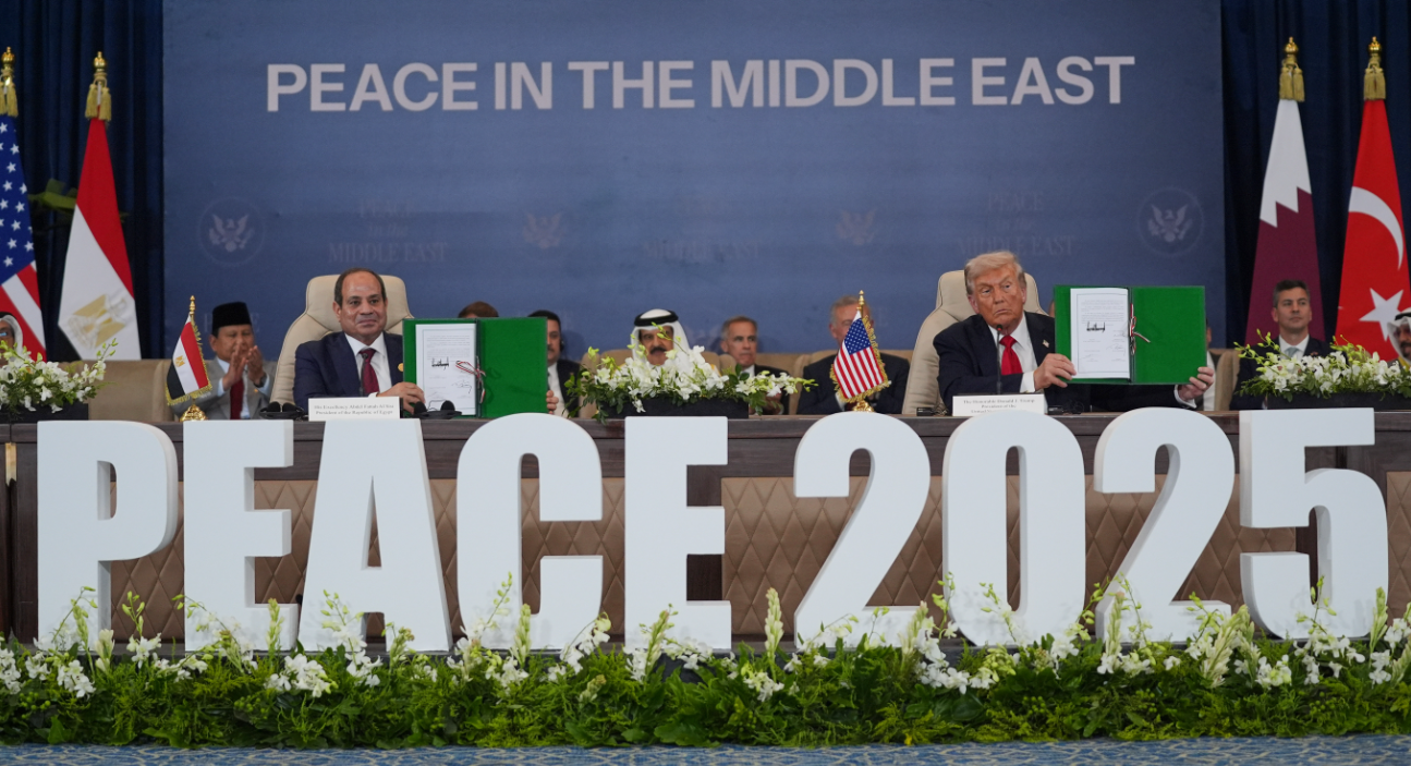 President Donald Trump and Egypt's President Abdel-Fattah el-Sissi hold signed documents during a summit to support ending the more than two-year Israel-Hamas war in Gaza after a breakthrough ceasefire deal, Monday, Oct. 13, 2025, in Sharm El Sheikh, Egypt.