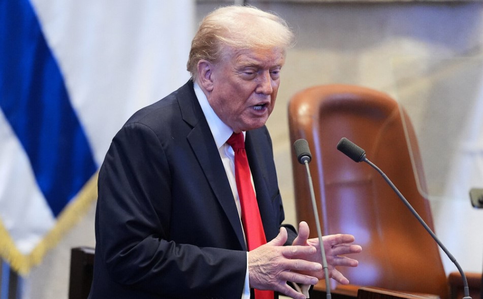 US President Donald Trump speaks at the Knesset, in Jerusalem on October 13, 2025