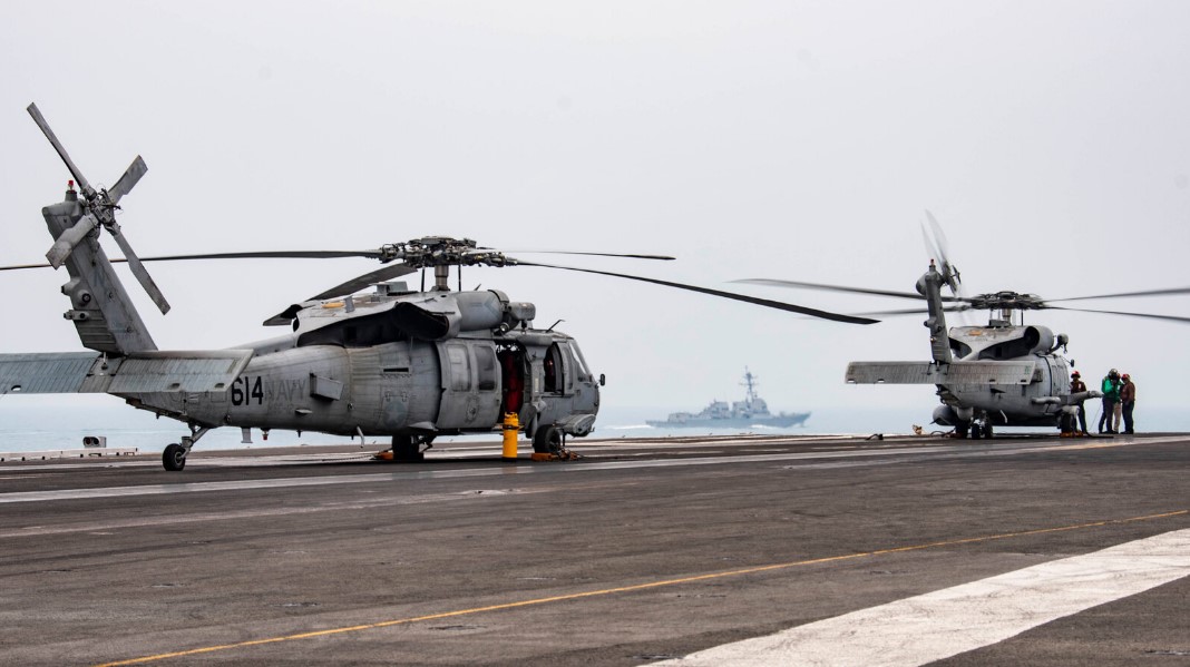 A MH-60R Sea Hawk on the flight deck of the U.S.S. Ronald Reagan in the South China Sea in 2020. The same model of helicopter went down in the sea on Sunday.