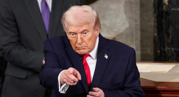 US President Donald Trump points a finger as he delivers the State of the Union address in the House Chamber of the US Capitol in Washington, DC, US, February 24, 2026.